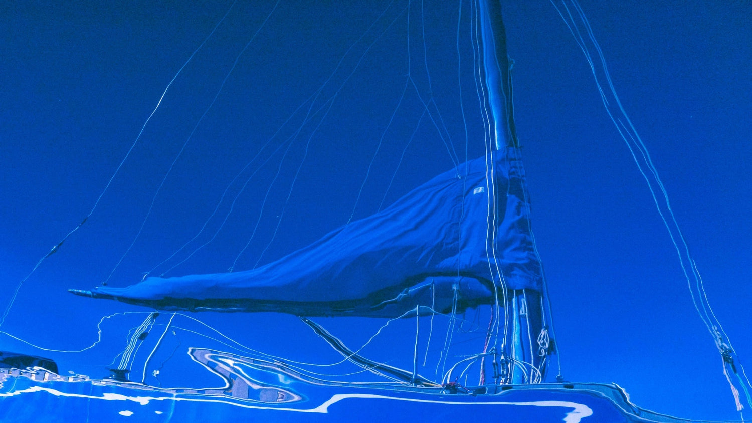 Sailboat with a clear blue sky background