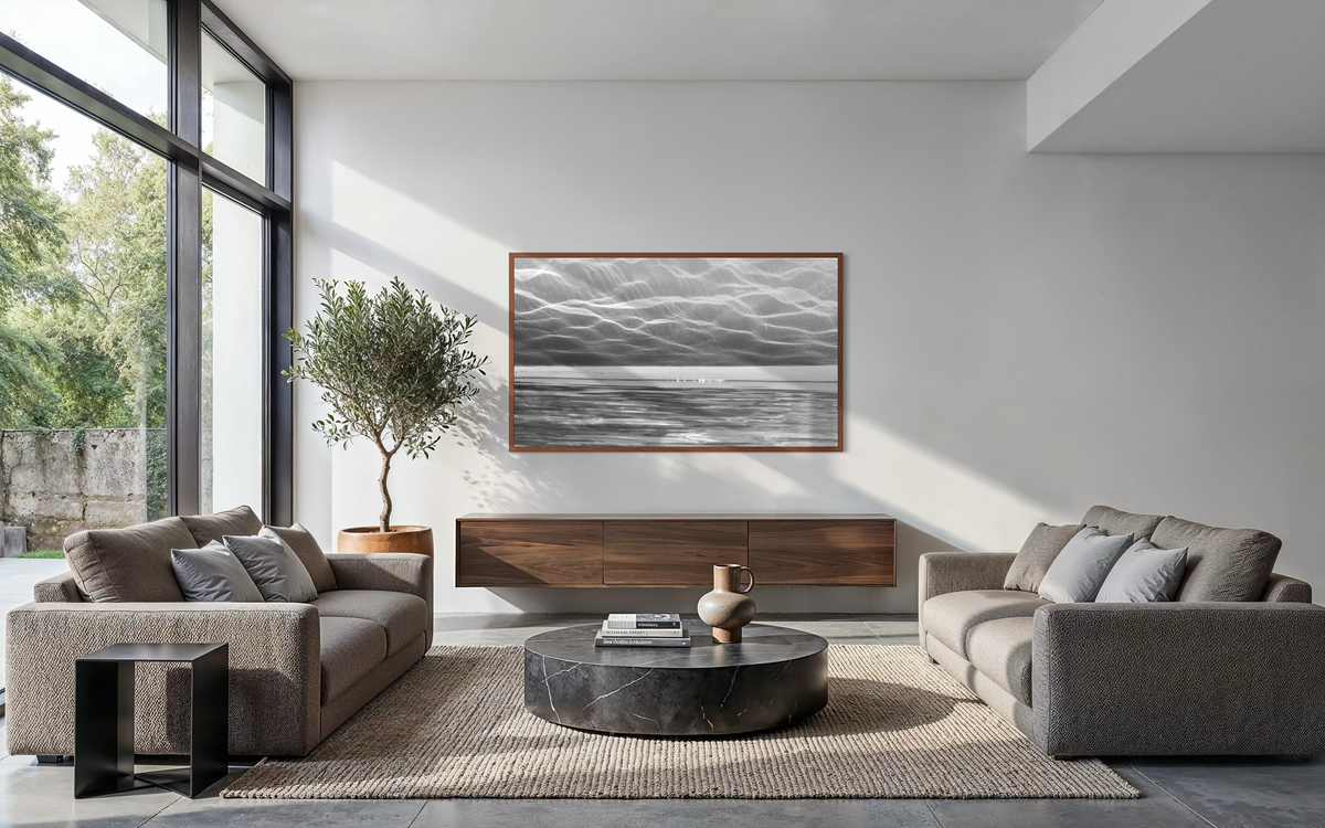 City of Light artwork featured above a media console in a spacious contemporary living room with natural light.