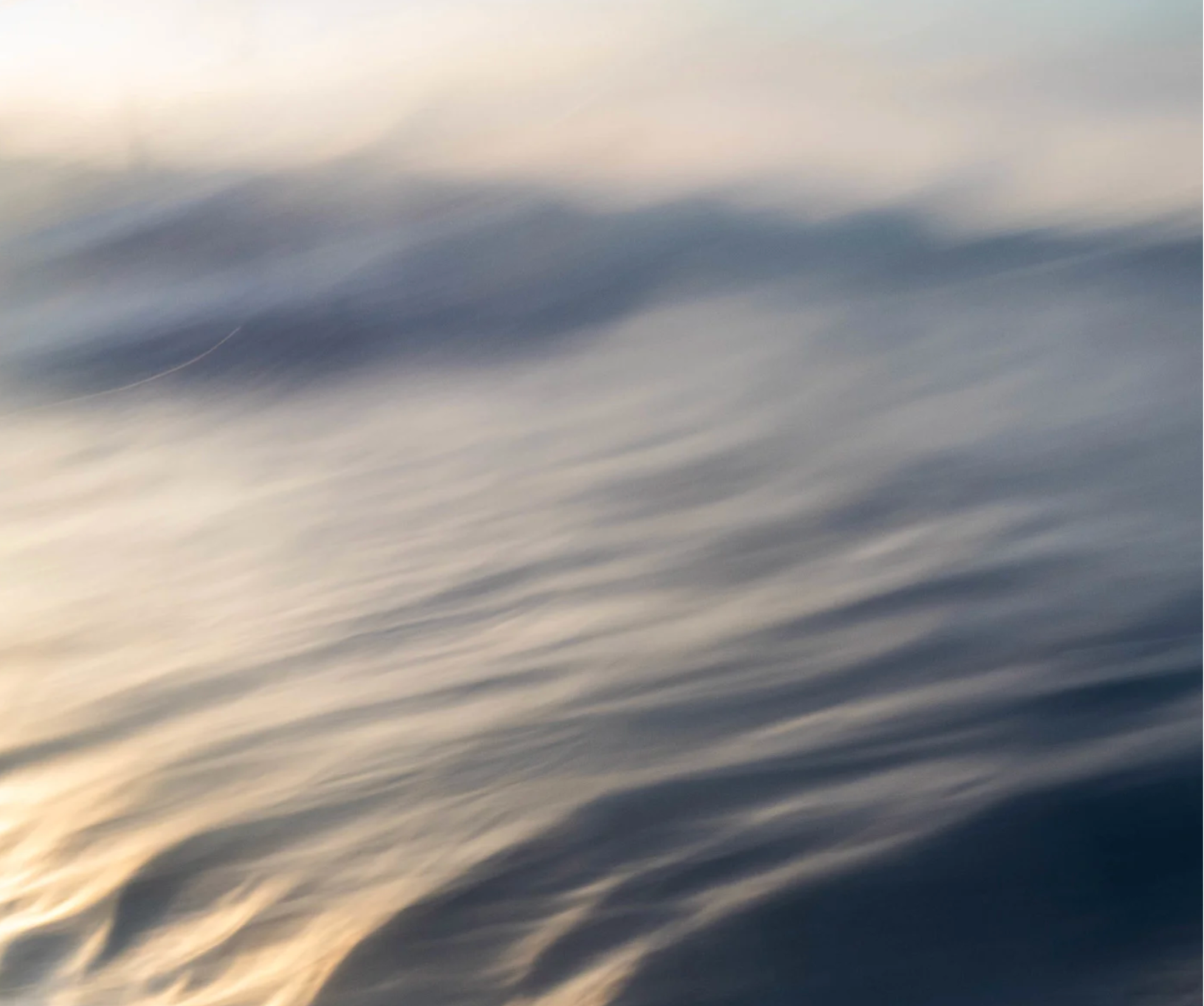 Abstract water surface with ripples and reflections