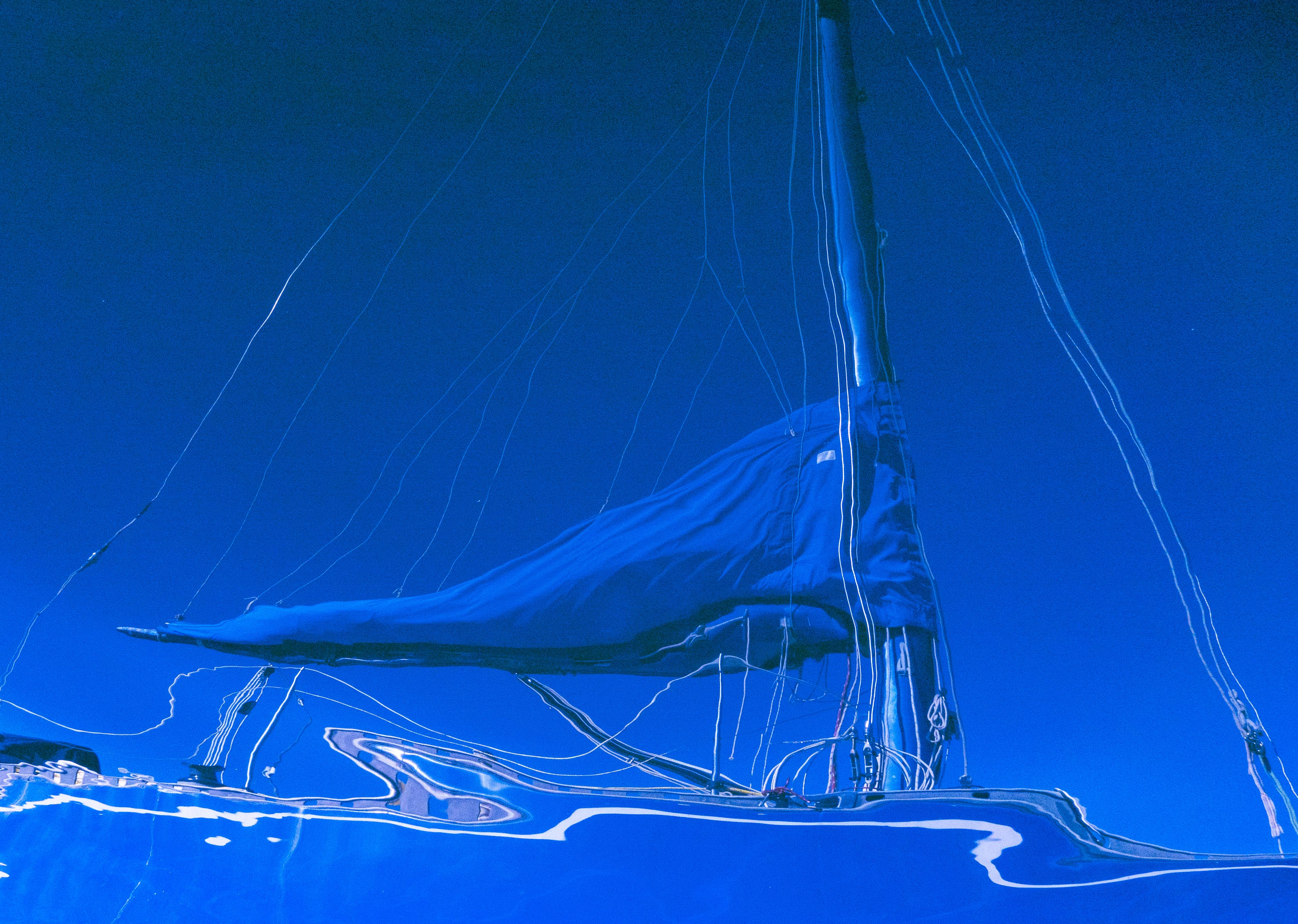 Sailboat with a clear blue sky background