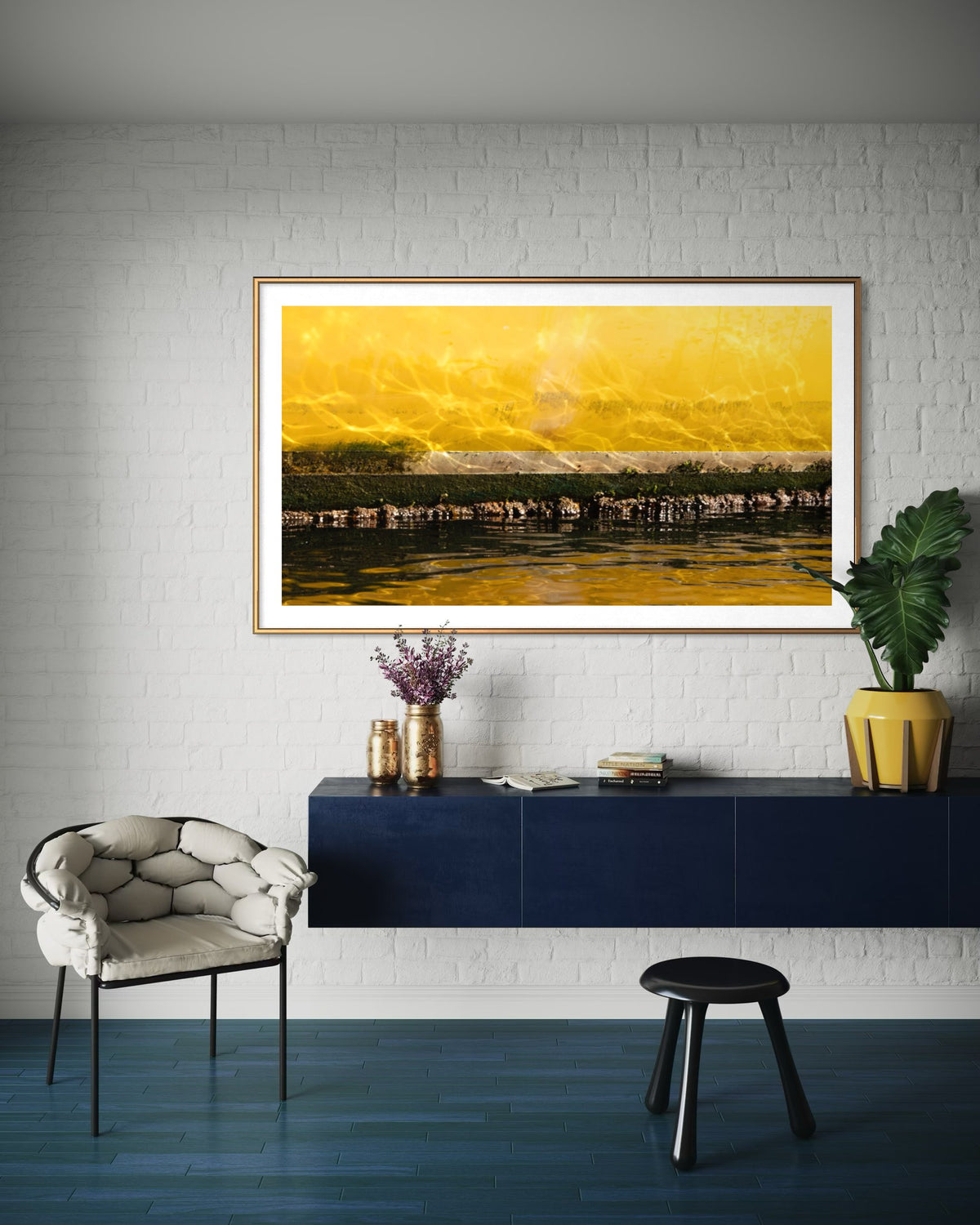 Impressions of a Turner Landscape 9 framed with a white border above a dark blue cabinet