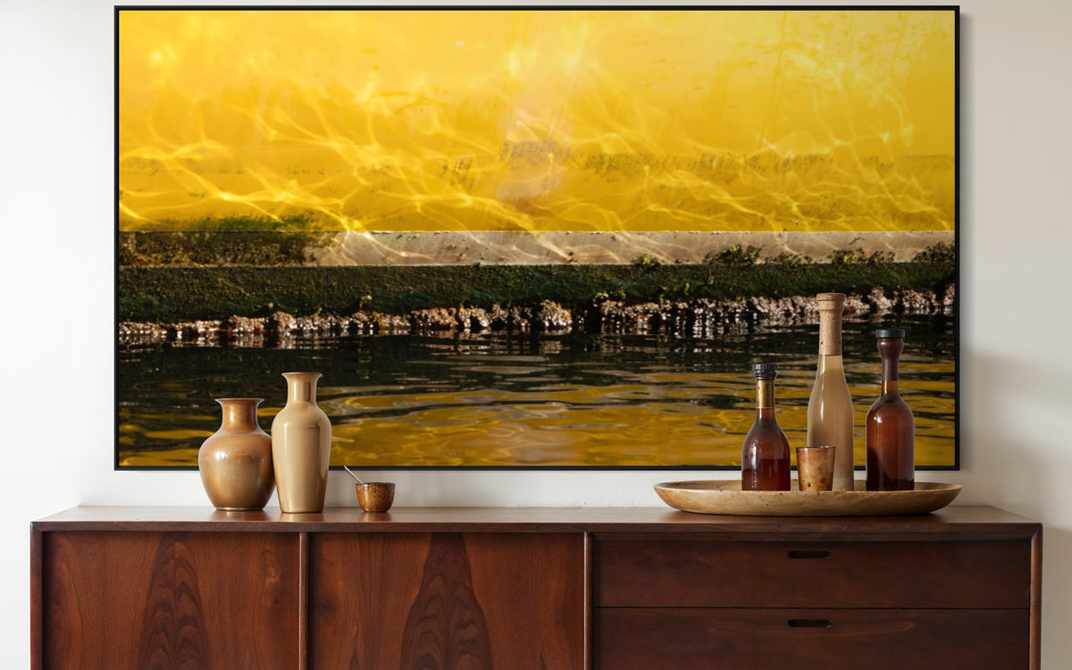 Impressions of a Turner Landscape 9 displayed above a timber sideboard with ceramic vessels