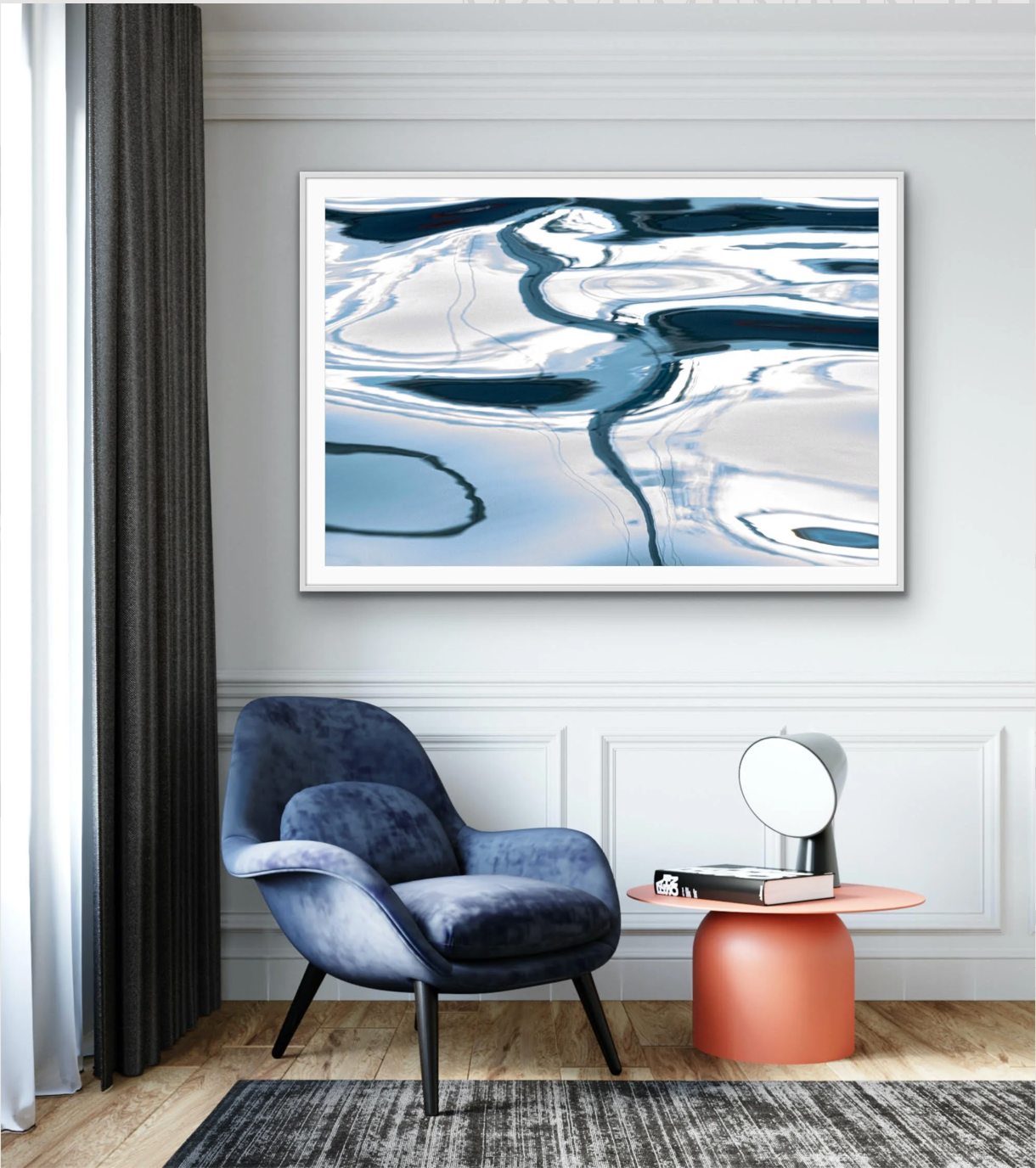 Movement in Blue by Ralph Kerle displayed in a modern minimalist living room with clean lines and colourful furnishings, allowing the artwork’s deep blues to become the focal point of the space