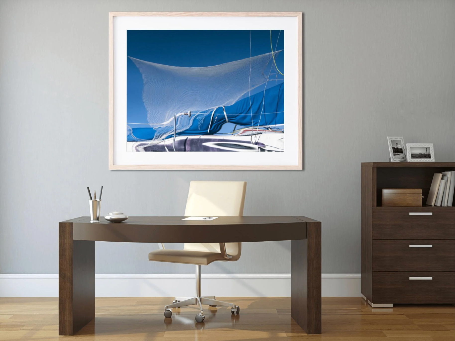Netted by Ralph Kerle displayed in a modern minimalist office interior with clean lines and neutral furnishings, allowing the artwork’s deep blues to become the focal point of the space