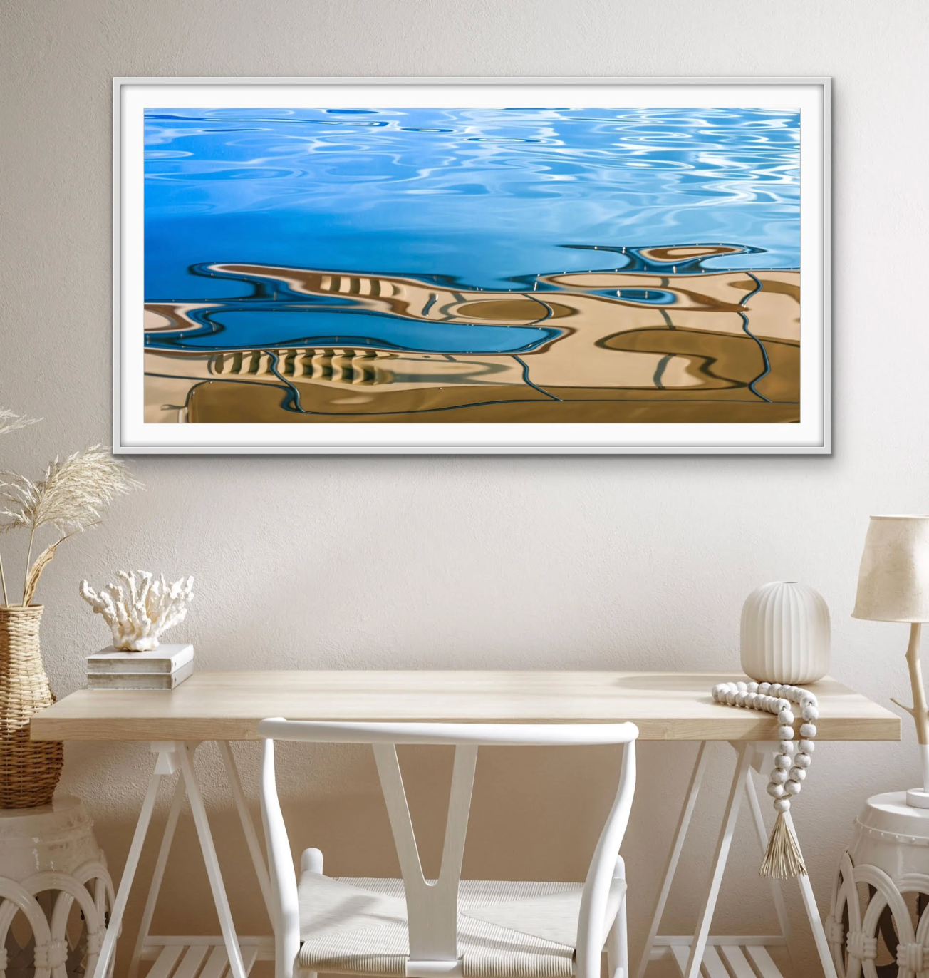 Offshore Aerial View 5 by Ralph Kerle displayed in a modern coastal minimalist living room with clean lines and neutral furnishings, allowing the artwork’s deep blues and unique style to become the focal point of the space