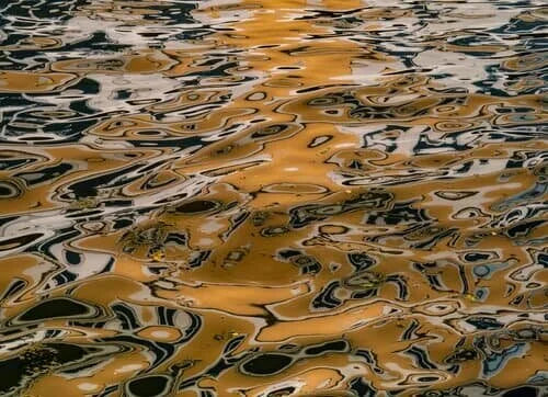 Orange and Black on Water artwork by Ralph Kerle