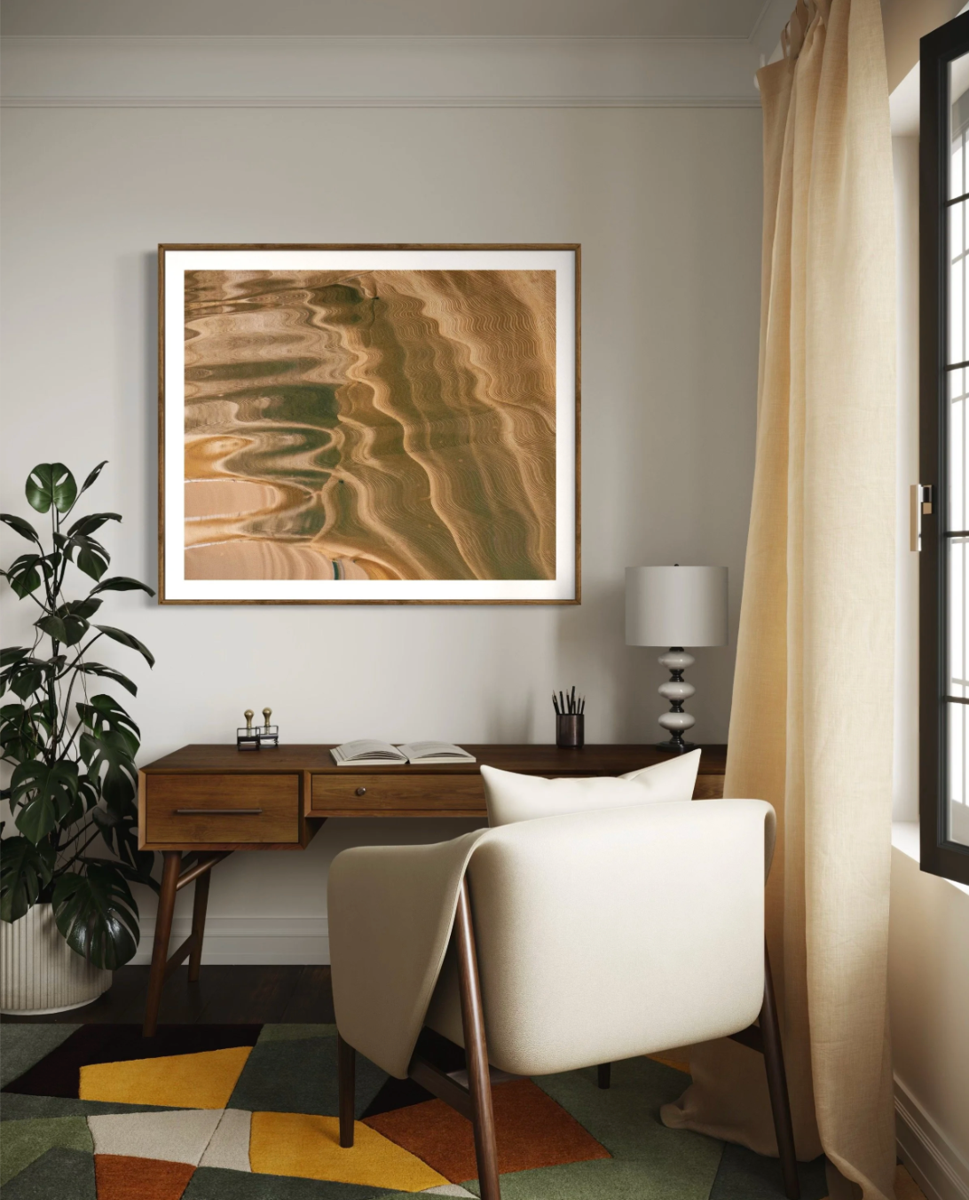Ripple Lines by Ralph Kerle hanging in a comfortable office room with soft furnishings, warm textures, and ambient lighting that complements the calming tones of the artwork