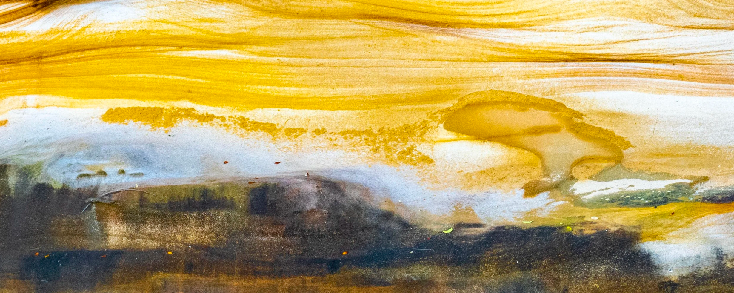 Abstract art with yellow, white, and brown brush strokes