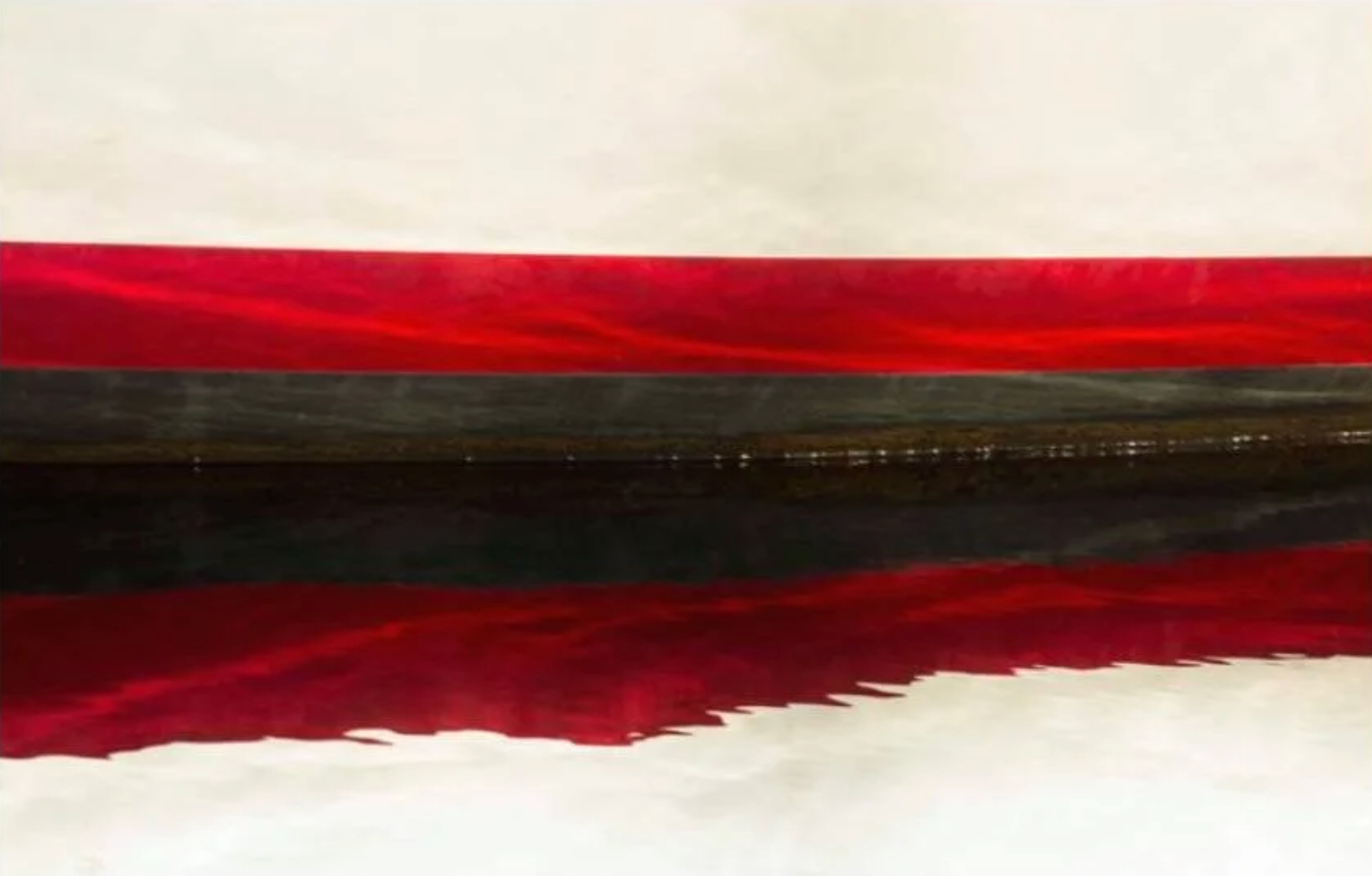 Close-up of red, black, and white fabric texture