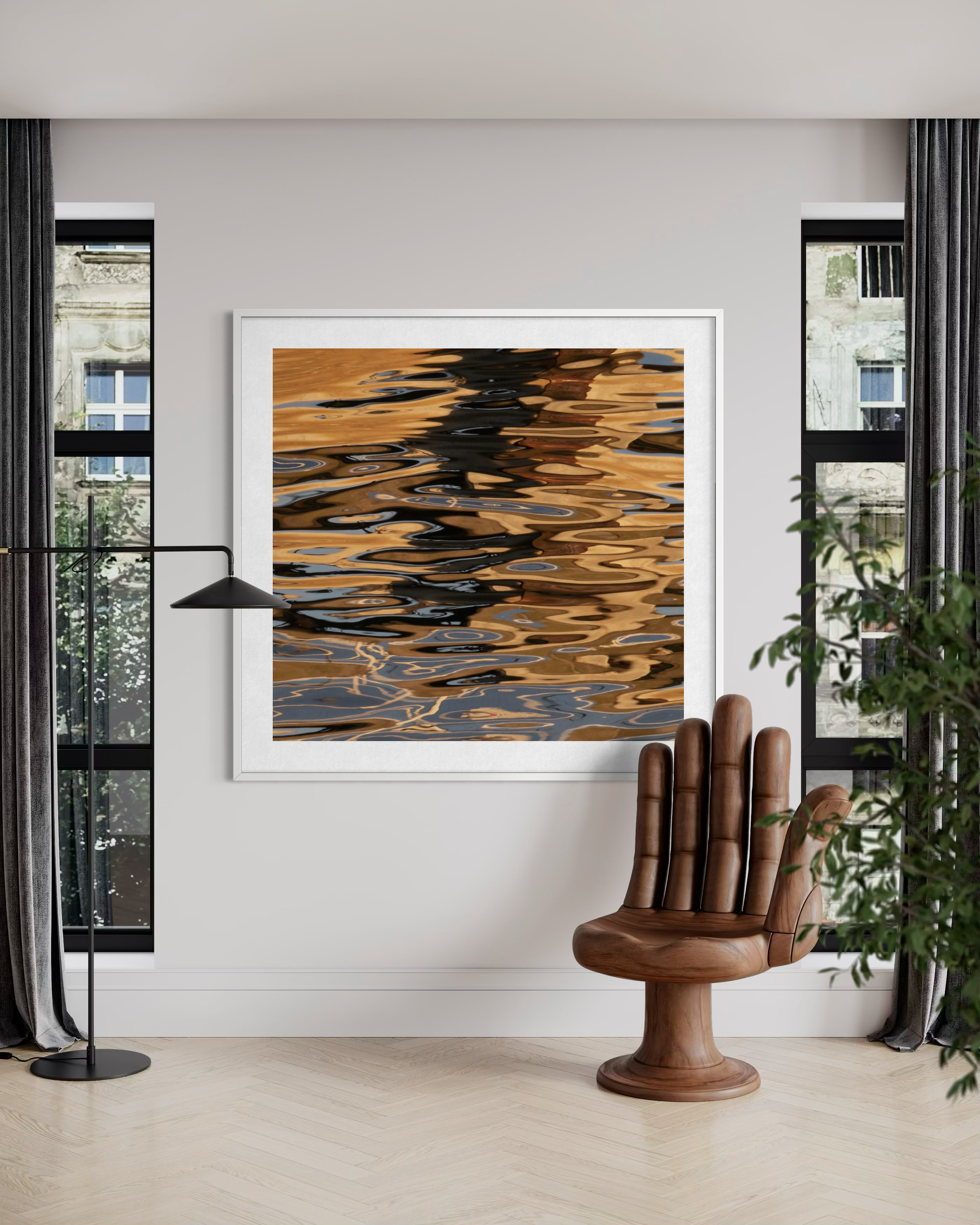 Water Dreaming 2 by Ralph Kerle displayed in a modern minimalist living space with clean lines and neutral furnishings, allowing the artwork’s deep blues and golds to become the focal point of the space