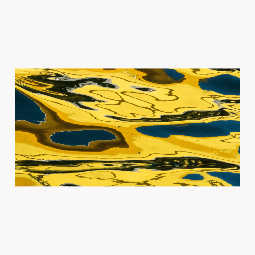 Abstract rectangular artwork Yellow Serpent Dreaming by Ralph Kerle with swirling marbled patterns in bright yellow, black, and deep blue, centered on a light gray background.